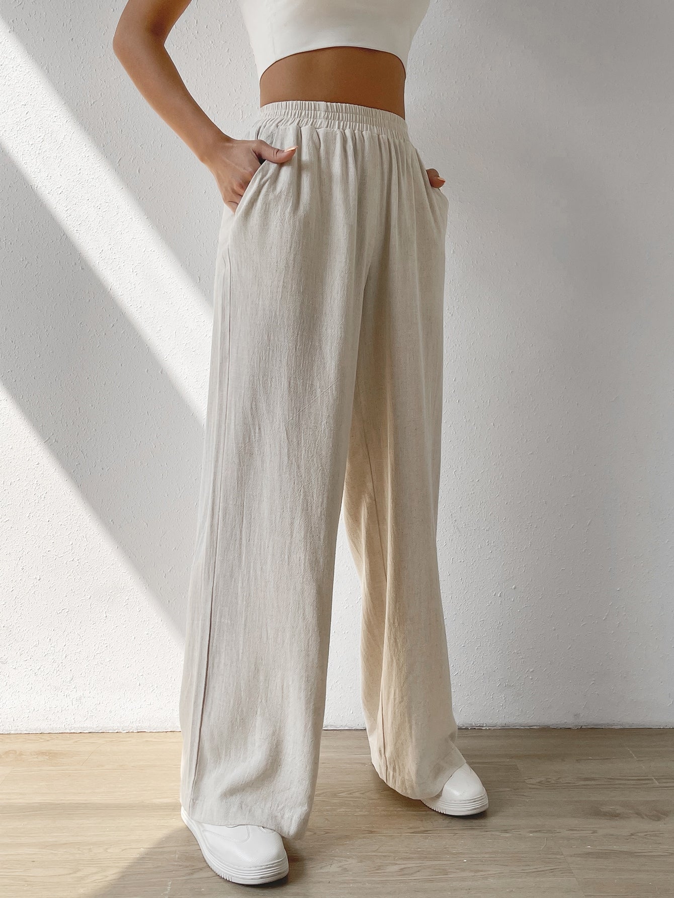 Regular Trousers With Elastic Waist And Slant Pockets