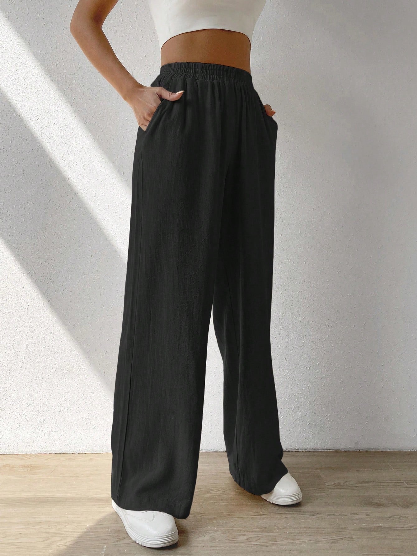 Regular Trousers With Elastic Waist And Slant Pockets