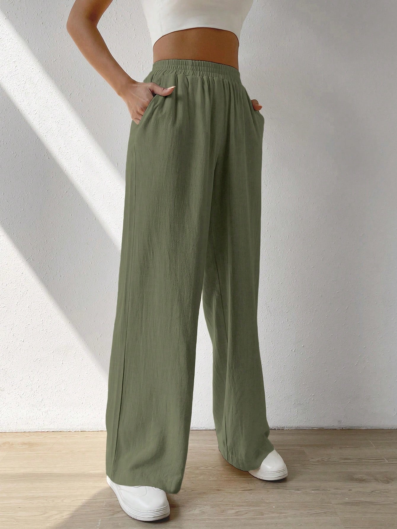 Regular Trousers With Elastic Waist And Slant Pockets