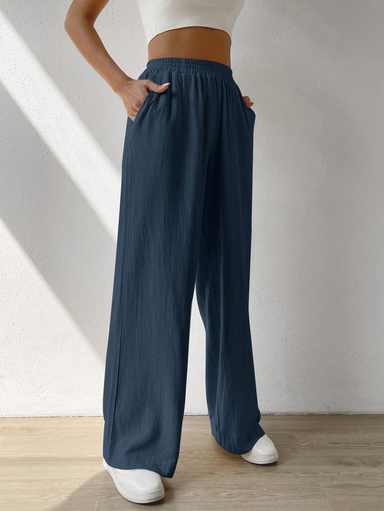 Regular Trousers With Elastic Waist And Slant Pockets