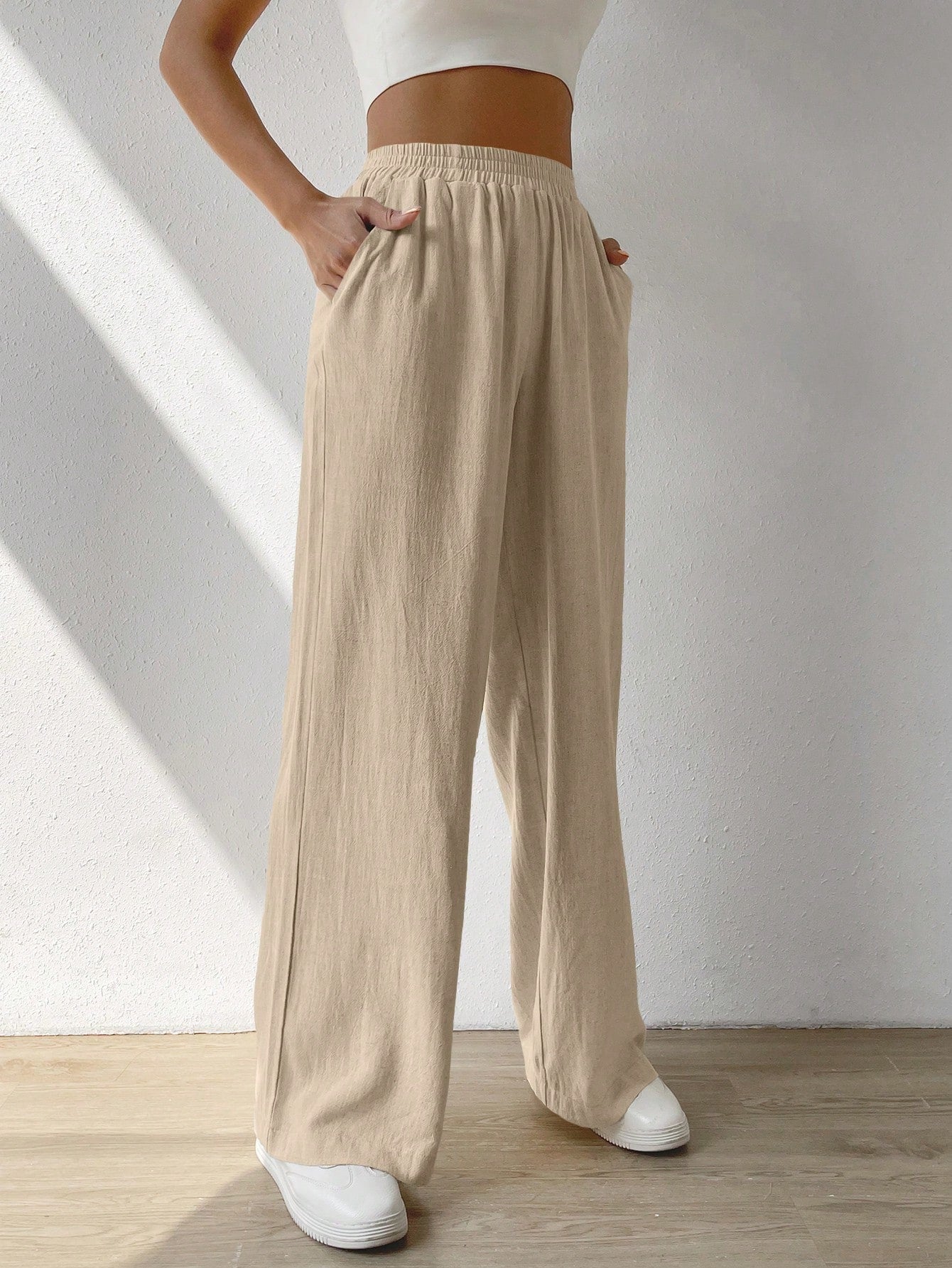 Regular Trousers With Elastic Waist And Slant Pockets