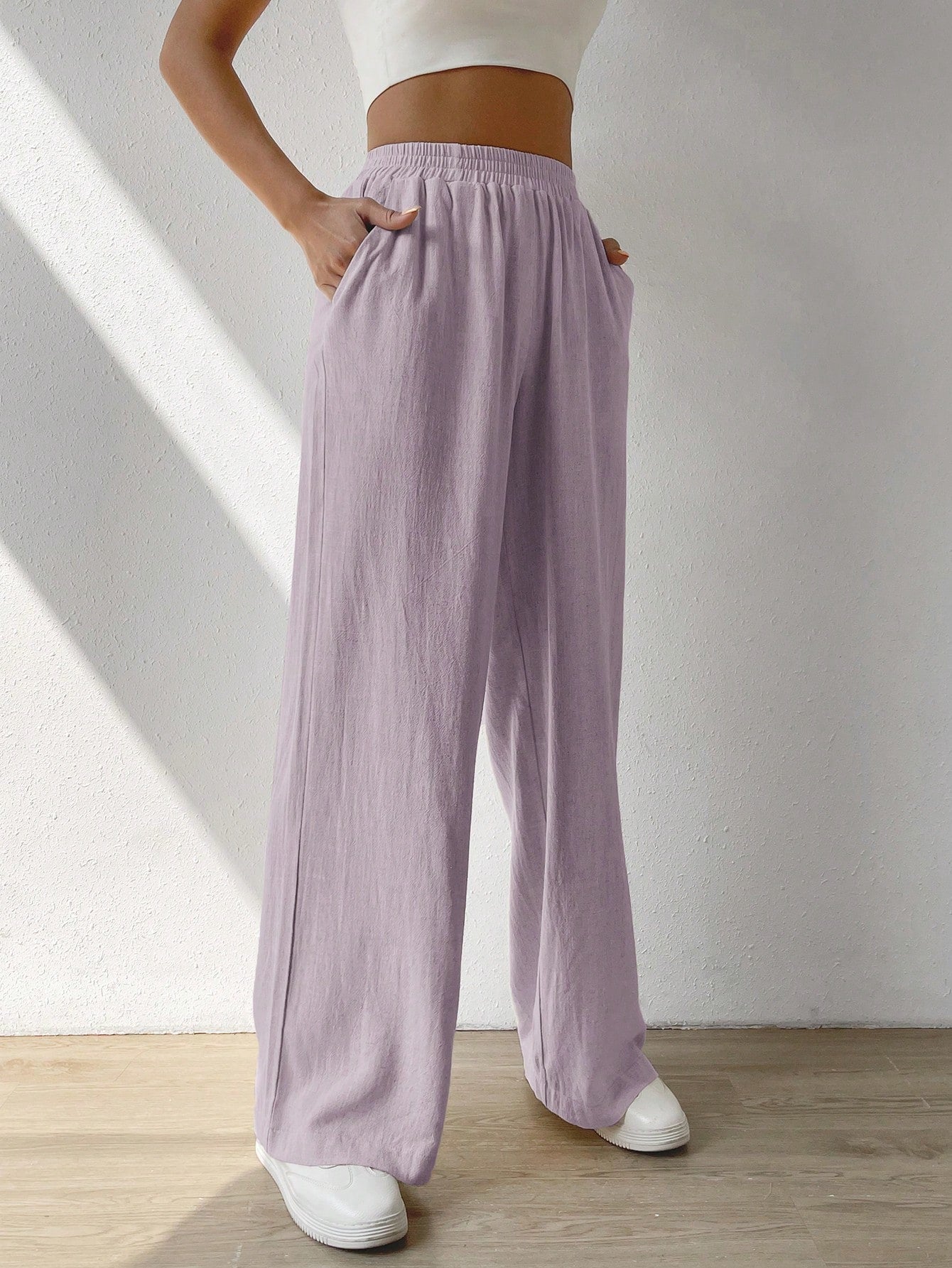 Regular Trousers With Elastic Waist And Slant Pockets