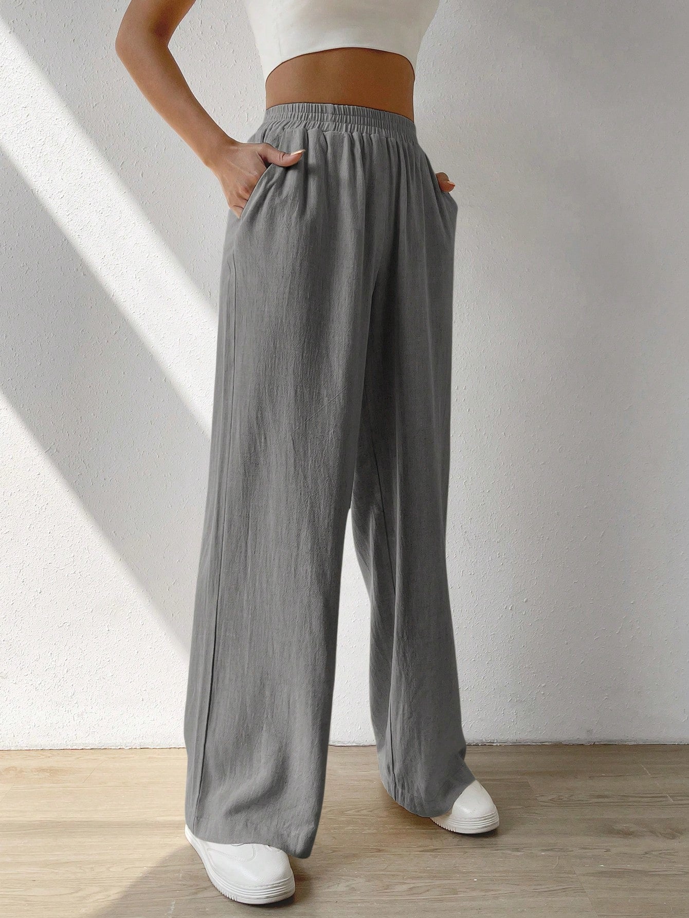 Regular Trousers With Elastic Waist And Slant Pockets