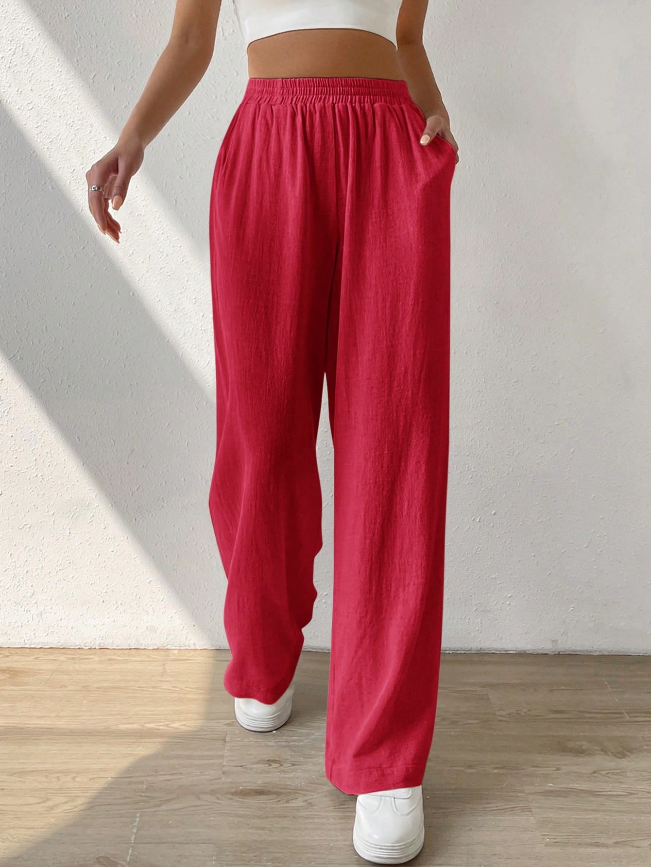 Regular Trousers With Elastic Waist And Slant Pockets